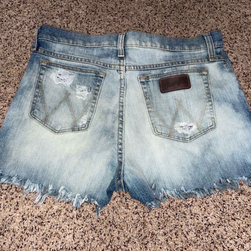 Wrangler distressed shorts.